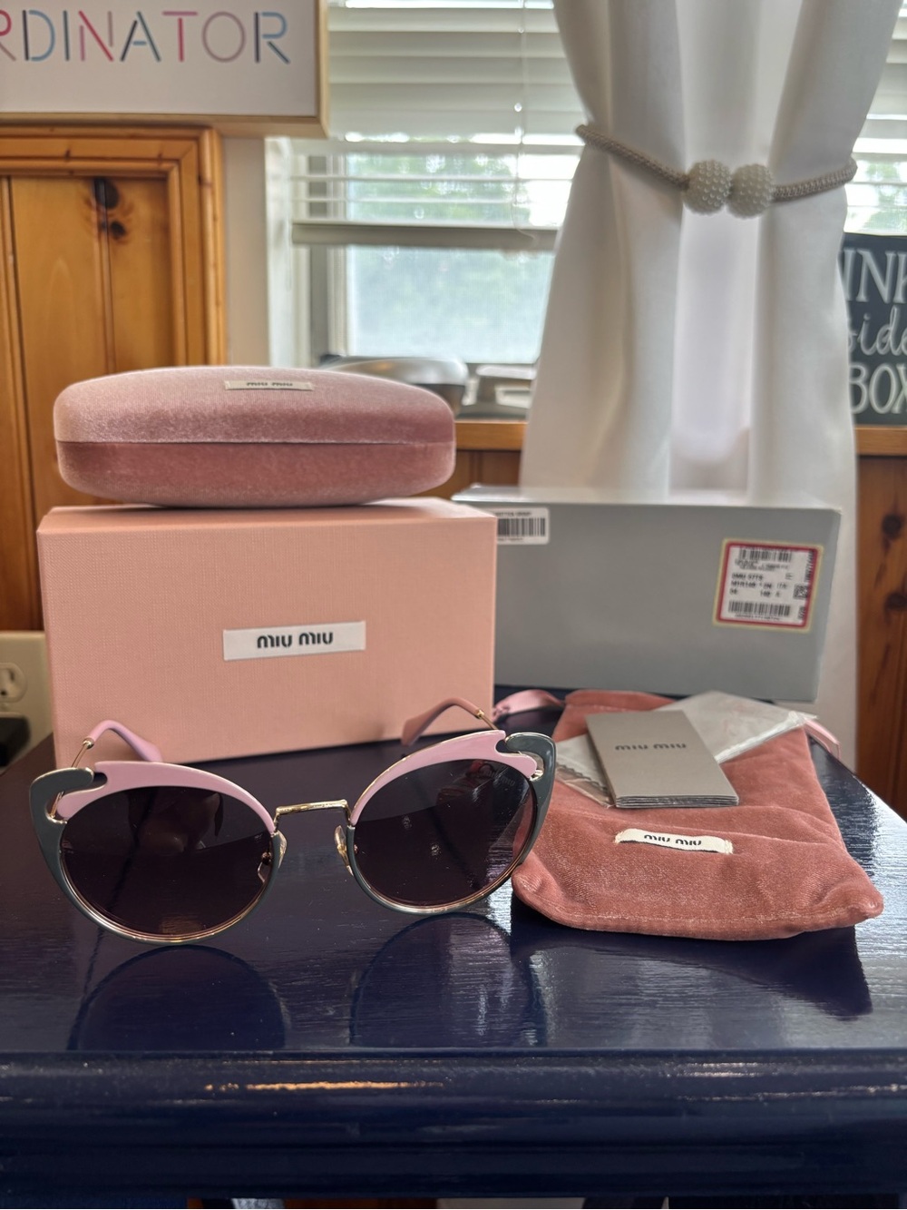 Miu Miu Pink Cat-Eye Sunglasses with Gold Bridge